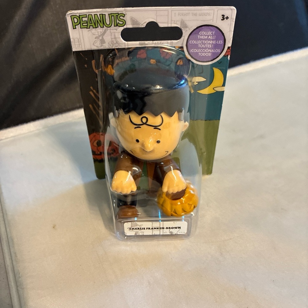 Peanuts Charlie Franken-Brown Figure with Pumpkin